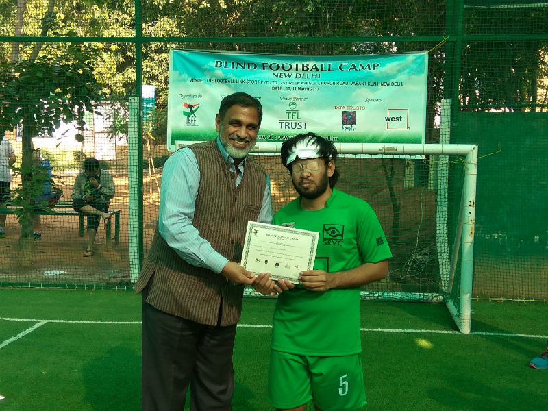 Giving certificates to players at Blind Football Demo game and Awareness session in New Delhi