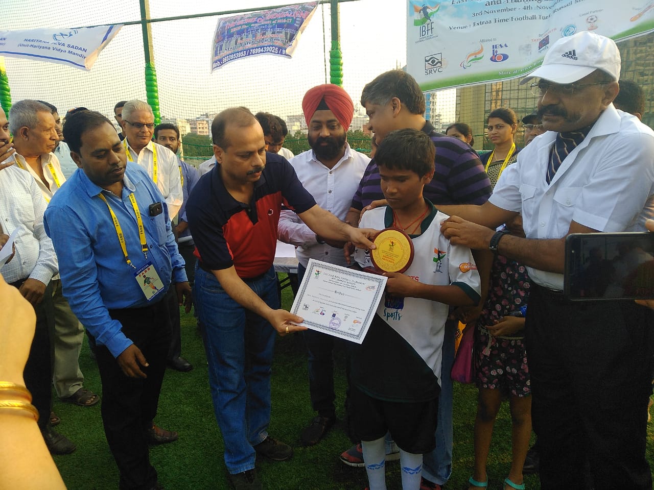Giving awards to little footballer on East Zone Blind Football Tournament, Kolkata