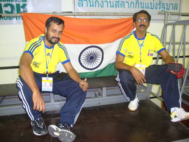 Sunil j mathew and m c roy with indian flag bangkok