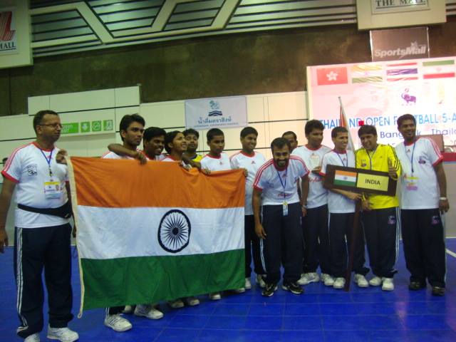Team india with indian flag at bangkok tournament