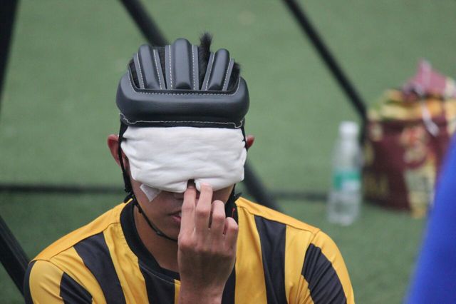 a close photograph of malaysian player