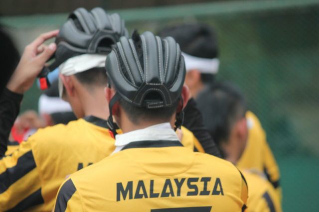 a close photograph of malaysian player