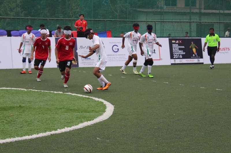 Indian player good tackling against laos