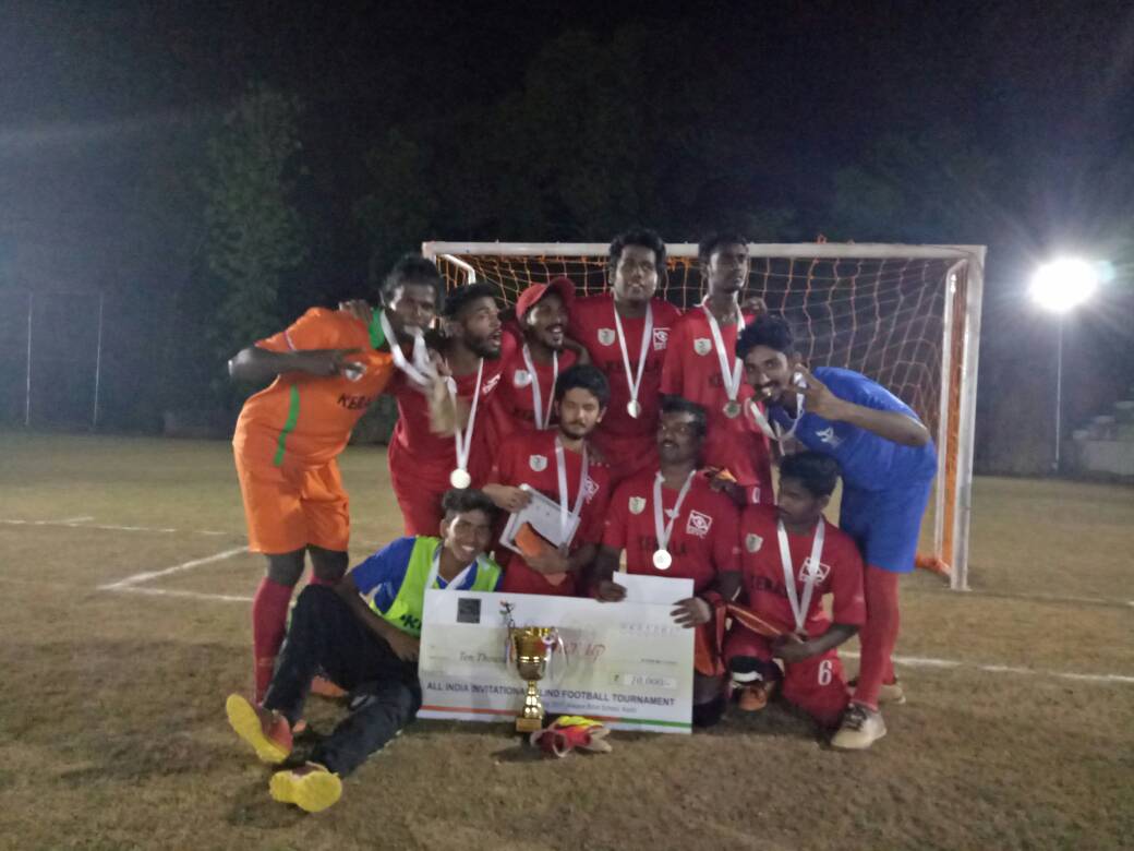 Kerala team with their trophy and cash prize